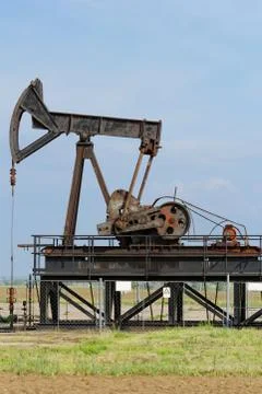 Oil pump jack Stock Photos