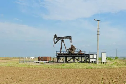 Oil pump jack Stock Photos