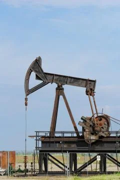Oil pump jack Stock Photos