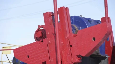 Oil pump jack pumping crude oil for fossil fuel energy Stock Footage 85390652
