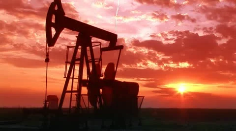 Oil Pump Jack at Sunset Stock Footage