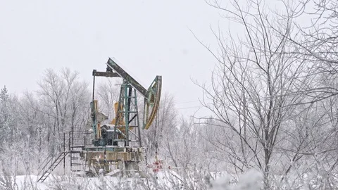 Oil pump jack. winter. Stock Footage 85806576