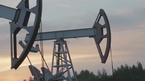 Oil Pump Jacks at Sunset Stock Footage 65570048