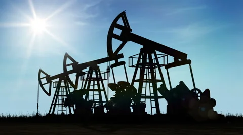 Oil Pump Jacks Working at the Shining Sun. Looped 3d animation. Stock Footage 61240424