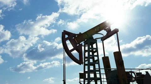 Oil pump machine working over bright sky Stock Footage 46892106