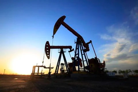 The oil pump is running. Stock Photos