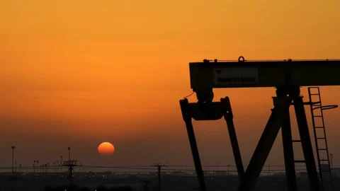Oil Pump Timelapse at Sunset - Zoom Out Stock Footage 87308638
