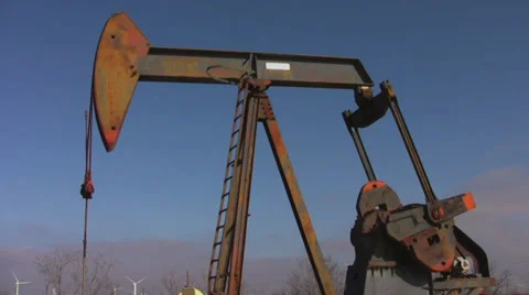 Oil pump to wind turbines Stock Footage 30779575