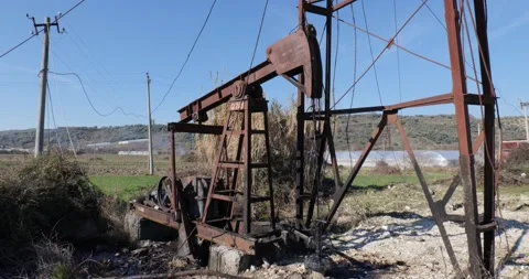 Oil pump working in a field Stock Footage 169482760