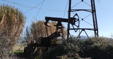 Oil pump working in a field Stock Footage 169483026