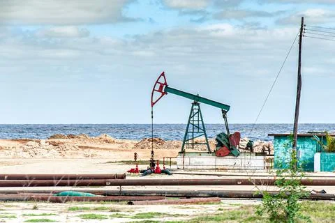 Oil pumping unit on Cuban's coasts Stock Photos
