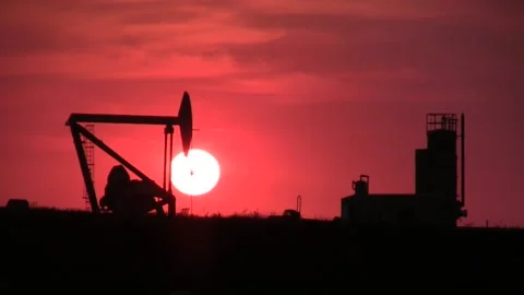 Oil Pumpjack Sunset left side Video stock 145241993