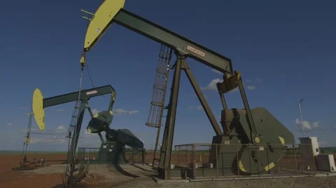 Oil Pumpjacks operating Stock Footage 47486599
