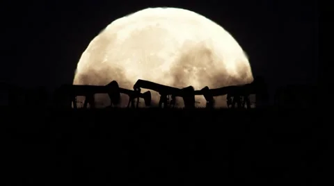 Oil Pumps on a Full Moon Background in a Polluted Environment Video stock 68998570