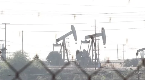 Oil Pumps washed out sunset Stock Footage 45890891