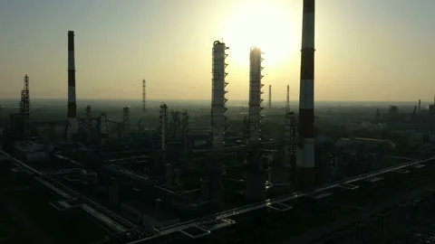 Oil Refinery. A column in rays of sun. Aerial view Stock Footage 229893706