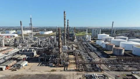 Oil refinery complex processing fuel with storage tanks Stock Photos