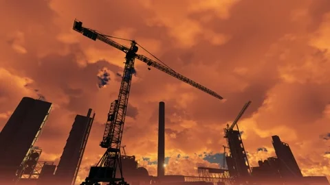 Oil refinery construction. Tower cranes stand against backdrop of structures. 스톡 동영상 131605503