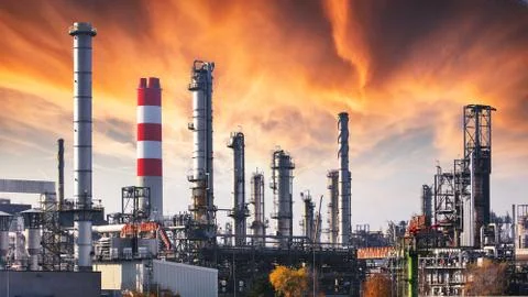 Oil refinery at dramatic twilight Stock Photos