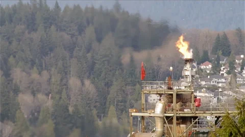 Oil refinery flare stack Stock Footage 36969018