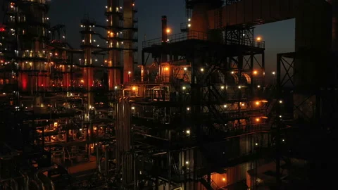 Oil refinery with illumination. Close-up. Columns, reactors in color light Stock Footage 237308510