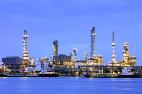 Oil refinery at twilight Stock Photos