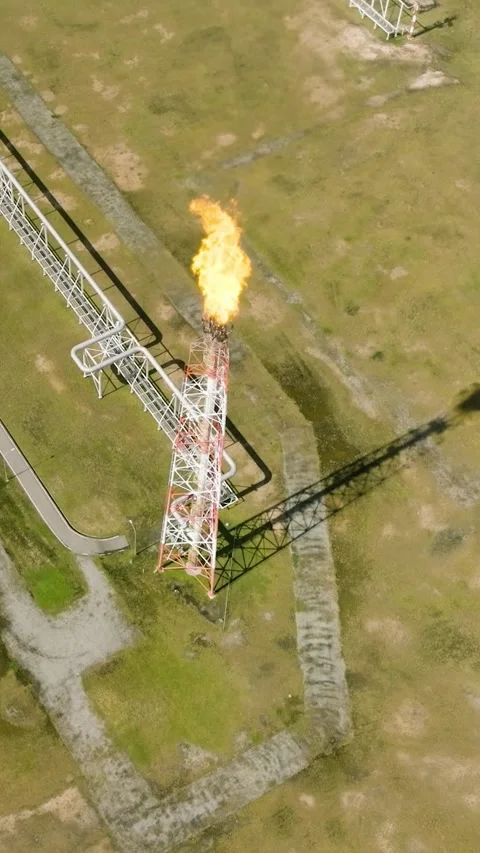 Oil-refining factory with constructions and flare stacks. Borneo, Sabah Stock Footage 252253269