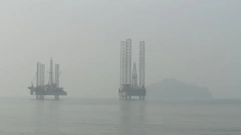 Oil Rig Drilling Platform Ocean in fog Stock Footage 261948040