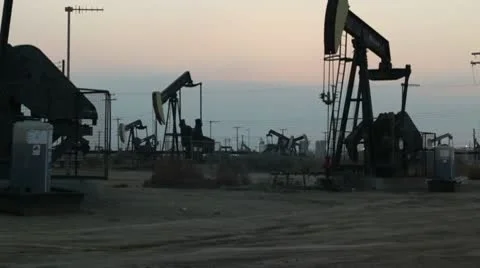 Oil Rig Field at sunset Pan Stock-Footage 10573264