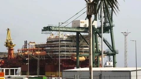 Oil rig platform with cranes docked in Tenerife port Stock Footage 319405097