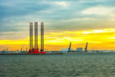 Oil Rig at sunset Stock Photos
