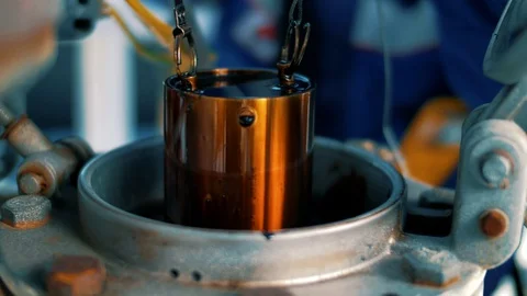 Oil sampling from oil storage for quality control Stock Footage 128549129