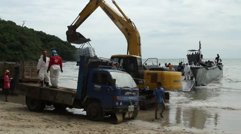 OIL SPILL BACK HOE HYDRAULIC EXCAVATOR LANDING CRAFT Stock Footage 27821067