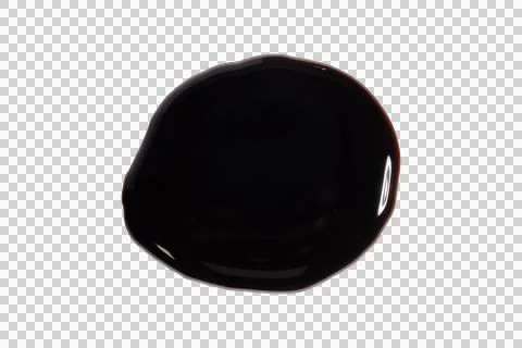 Oil spill dark puddle surface reflection viscous liquid closeup Stockfoto's