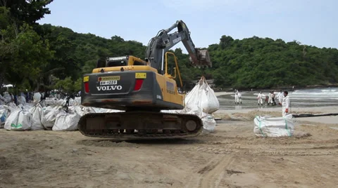 OIL SPILL DISASTER BACK HOE HYDRAULIC EXCAVATOR Stock Footage 27670463