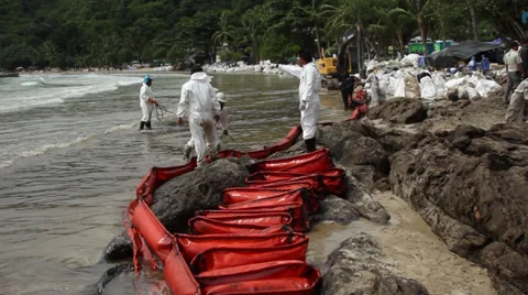 OIL SPILL DISASTER WORKERS BOOM Stock Footage 27746000
