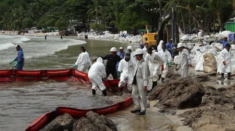 OIL SPILL DISASTER WORKERS BOOM Stock Footage 27749905