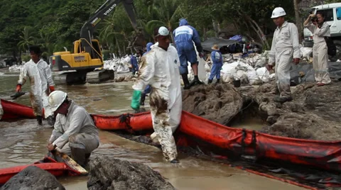 OIL SPILL DISASTER WORKERS BOOM Stock Footage 27762185