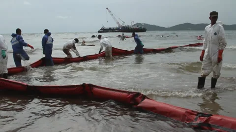 OIL SPILL DISASTER WORKERS BOOM Stock Footage 27767922