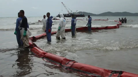 OIL SPILL DISASTER WORKERS BOOM Stock Footage 27785227