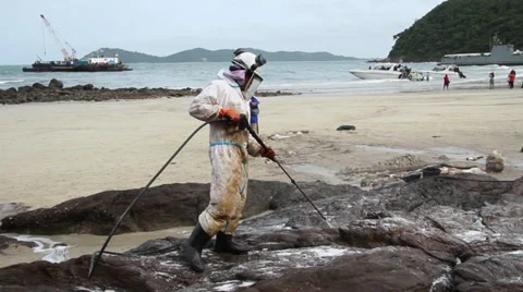 OIL SPILL DISASTER WORKERS SPRAY CHEMICAL DISPERSANTS CLEAN UP Stock Footage 27888735