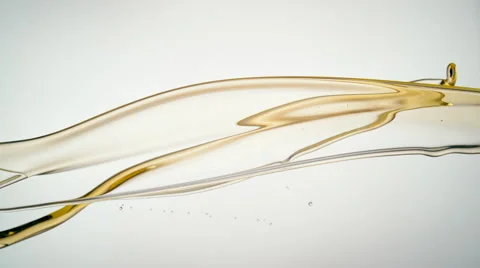 Oil splash in the air. Slow Motion. Stock Footage