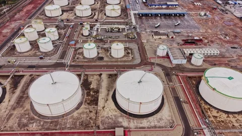 Oil storage facility in Spain shows large tanks and pipelines Stock Footage 333114931
