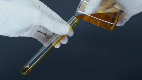 Oil in a test tube. Stock Footage 171311024