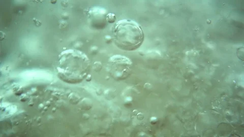 Oil in Water Stock Footage 76987225