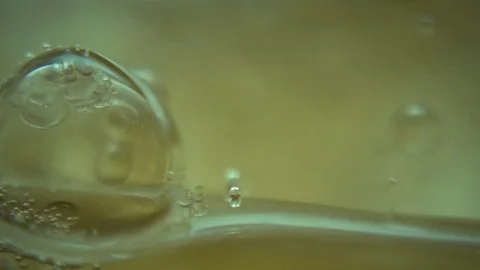 Oil in Water Stock Footage 76987327