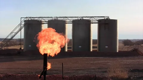 Oil Well Methane Gas Flare - 2 crops wide Stock Footage