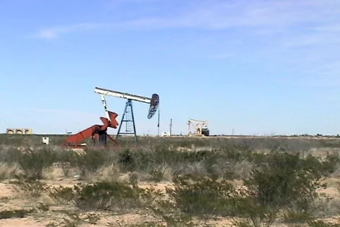 Oil well Texas pumping Stock Footage