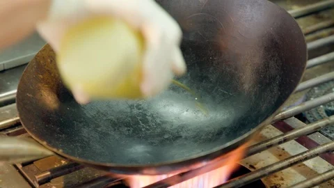 Oil in wok Stock Footage 89120604