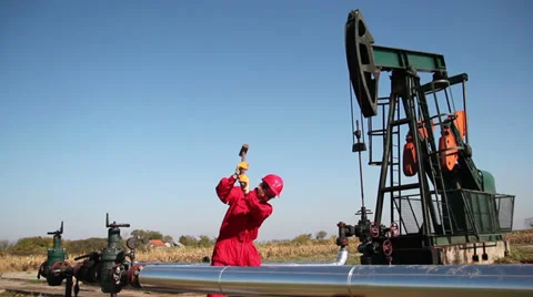 Oil Worker in Action With a Sledgehammer Stock Footage 32775002